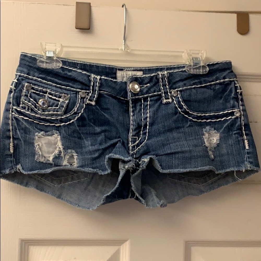 Jean shorts with rips and jewels